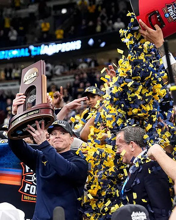 Dusty May, Michigan Team, and Midwest Regional Championship Trophy