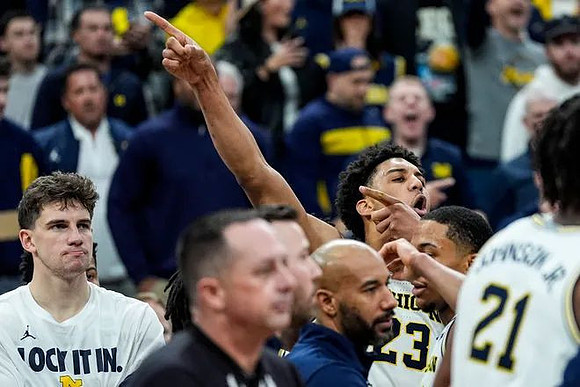 Will Tschetter (42), Yaxel Lendeborg (23), Nimari Burnett (4), and Morez Johnson Jr. (21)