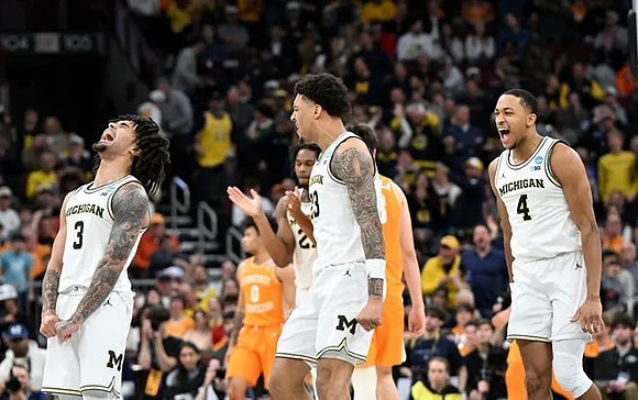 Elliot Cadeau (3), Morez Johnson Jr. (21), Yaxel Lendeborg (23), and Nimari Burnett (4)