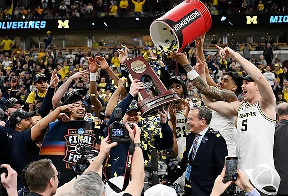 Dusty May, Michigan Team, and Midwest Regional Championship Trophy