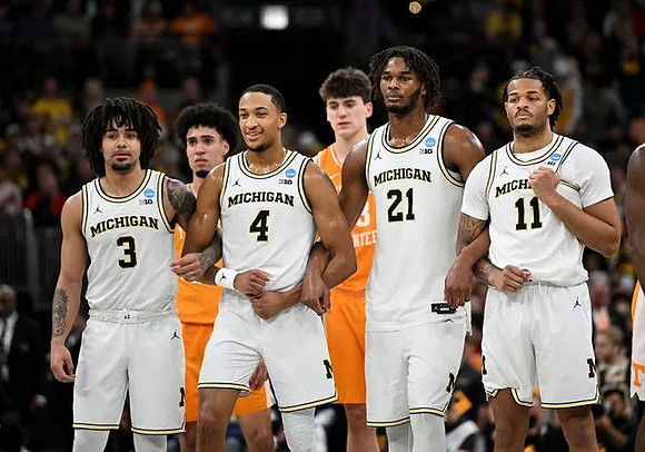 Elliot Cadeau (3), Nimari Burnett (4), Morez Johnson Jr. (21), and Roddy Gayle Jr. (11)