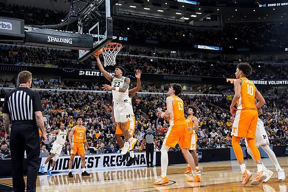 Yaxel Lendeborg (23) and Nimari Burnett (4)