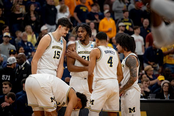 Yaxel Lendeborg (23), Aday Mara (15), Morez Johnson Jr. (21), Nimari Burnett (4), and Elliot Cadeau (3)