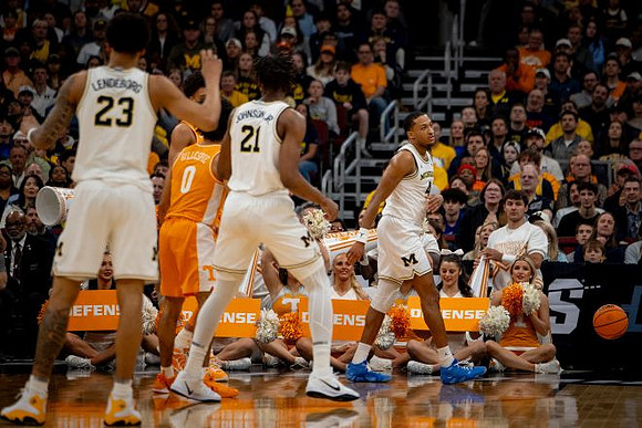 Yaxel Lendeborg (23), Morez Johnson Jr. (21), and Nimari Burnett (4)