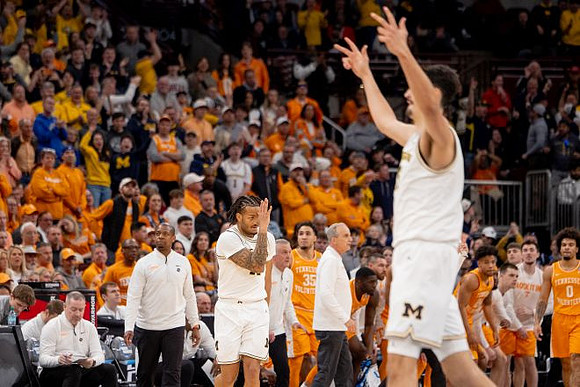 Tennessee Head Coach Rick Barnes, Roddy Gayle Jr. (11), and Aday Mara (15)