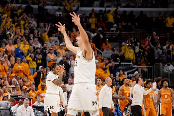 Tennessee Head Coach Rick Barnes, Roddy Gayle Jr. (11), and Aday Mara (15)