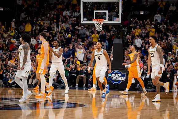 Elliot Cadeau (3), Morez Johnson Jr. (21), Nimari Burnett (4), and Yaxel Lendeborg (23)