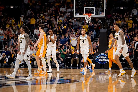 Elliot Cadeau (3), Morez Johnson Jr. (21), Nimari Burnett (4), and Yaxel Lendeborg (23)