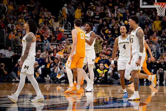 Elliot Cadeau (3), Morez Johnson Jr. (21), Nimari Burnett (4), and Yaxel Lendeborg (23)