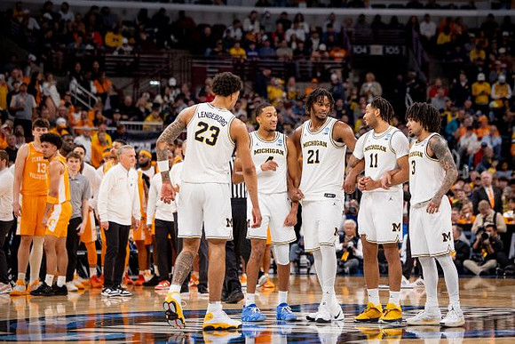 Yaxel Lendeborg (23), Nimari Burnett (4), Morez Johnson Jr. (21), Roddy Gayle Jr. (11), and Elliot Cadeau (3)