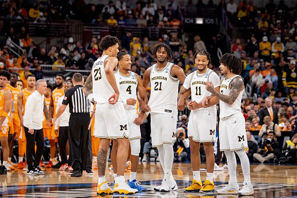 Yaxel Lendeborg (23), Nimari Burnett (4), Morez Johnson Jr. (21), Roddy Gayle Jr. (11), and Elliot Cadeau (3)