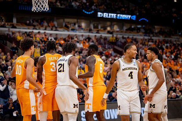 Morez Johnson Jr. (21), Nimari Burnett (4), and Trey McKenney (1)