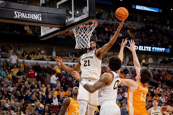 Morez Johnson Jr. (21) and Yaxel Lendeborg (23)