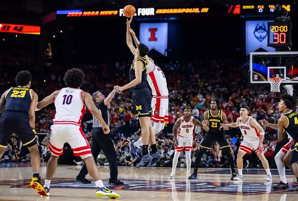 Yaxel Lendeborg (23), Aday Mara (15), Morez Johnson Jr. (21), and Nimari Burnett (4)