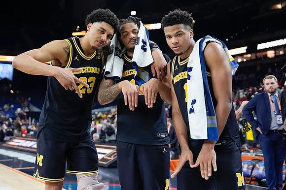 Yaxel Lendeborg (23), Roddy Gayle Jr. (11), and Trey McKenney (1)