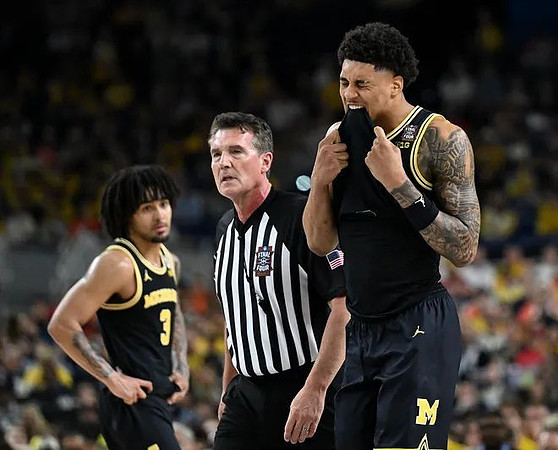Elliot Cadeau (3) and Morez Johnson Jr. (21)