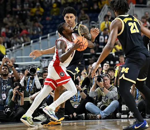 Yaxel Lendeborg (23) and Morez Johnson Jr. (21)