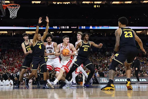 Aday Mara (15), Nimari Burnett (4), Morez Johnson Jr. (21), and Yaxel Lendeborg (23)