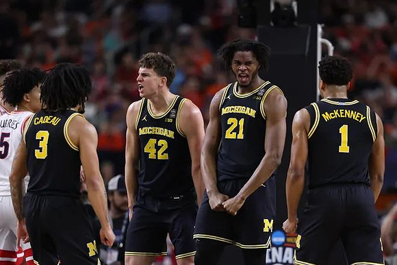 Elliot Cadeau (3), Will Tschetter (42), Morez Johnson Jr. (21), and Trey McKenney (1)