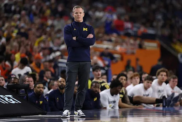 Dusty May and Michigan Team
