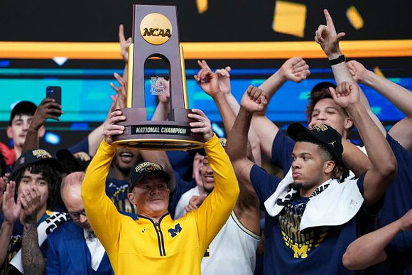 Dusty May, Michigan Team, and National Championship Trophy