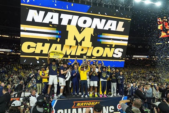 Dusty May, Michigan Team, and National Championship Trophy