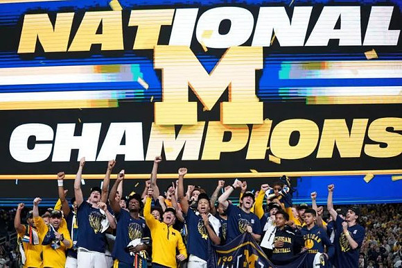 Dusty May and Michigan Team