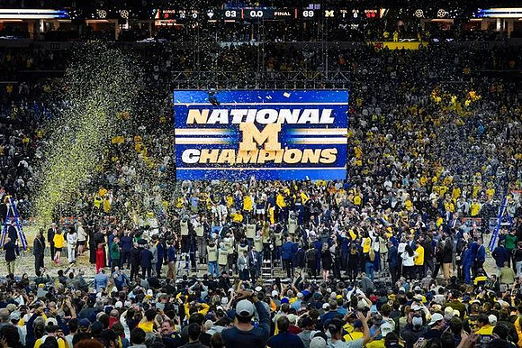 Dusty May and Michigan Team