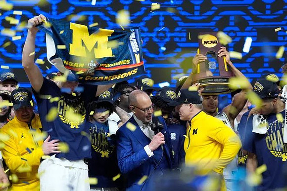 Dusty May, Michigan Team, and National Championship Trophy