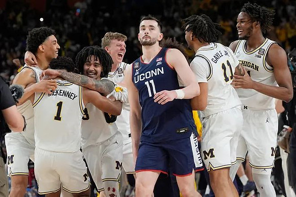 Yaxel Lendeborg (23), Trey McKenney (1), Elliot Cadeau (3), Charlie May (12), Roddy Gayle Jr. (11), and Morez Johnson Jr. (21)