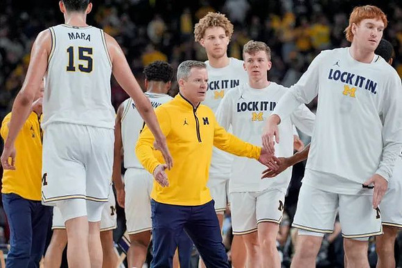 Dusty May and Michigan Team