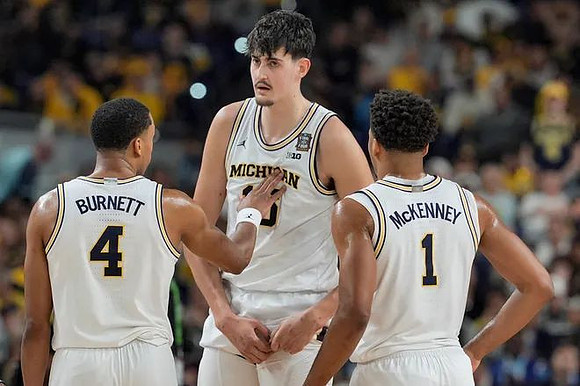 Nimari Burnett (4), Aday Mara (15), and Trey McKenney (1)
