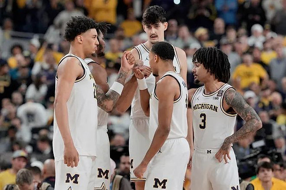 Yaxel Lendeborg (23), Morez Johnson Jr. (21), Aday Mara (15), Nimari Burnett (4), and Elliot Cadeau (3)