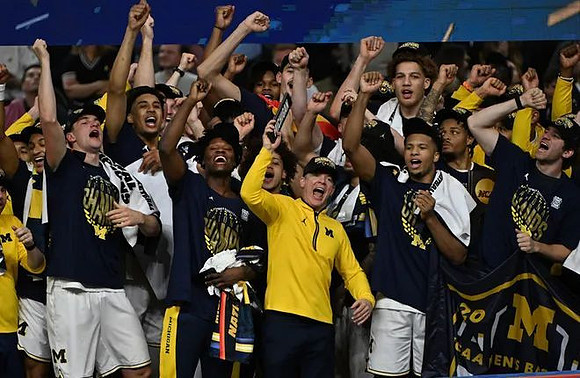 Dusty May and Michigan Team