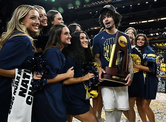 Elliot Cadeau (3) and National Championship Trophy
