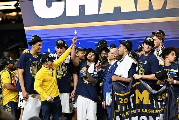 Dusty May and Michigan Team