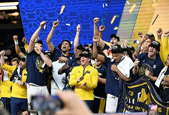 Dusty May and Michigan Team