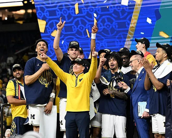Dusty May and Michigan Team
