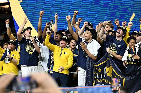 Dusty May and Michigan Team