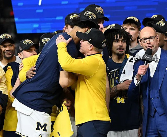 Dusty May and Michigan Team