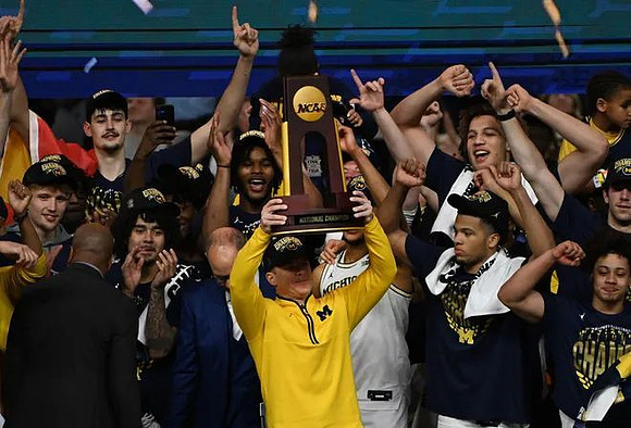 Dusty May, Michigan Team, and National Championship Trophy