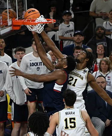 Elliot Cadeau (3), Aday Mara (15), and Morez Johnson Jr. (21)