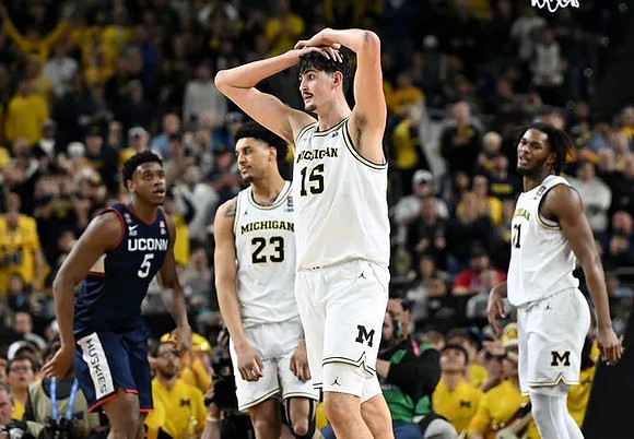 Yaxel Lendeborg (23), Aday Mara (15), and Morez Johnson Jr. (21)