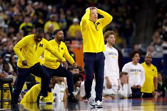 Dusty May and Michigan Team