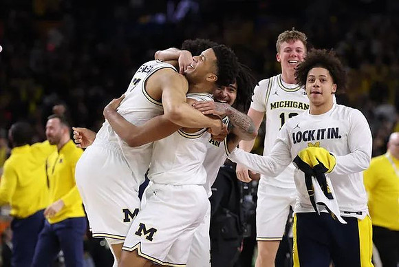Yaxel Lendeborg (23), Trey McKenney (1), Charlie May (12), and Howard Eisley Jr. (7)