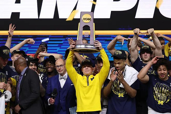 Dusty May, Michigan Team, and National Championship Trophy