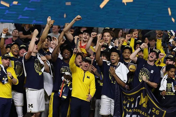 Dusty May and Michigan Team