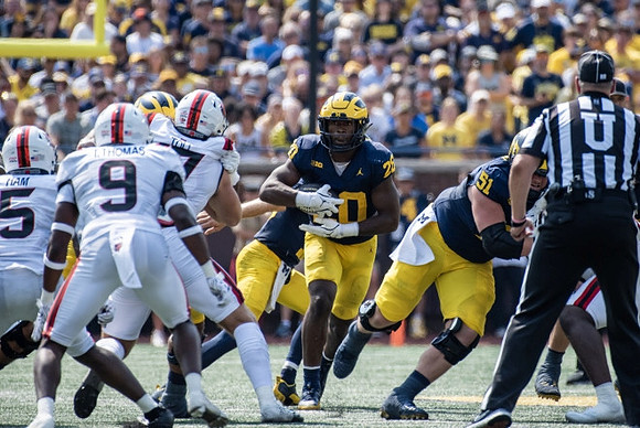 Kalel Mullings (20) and Greg Crippen (51)
