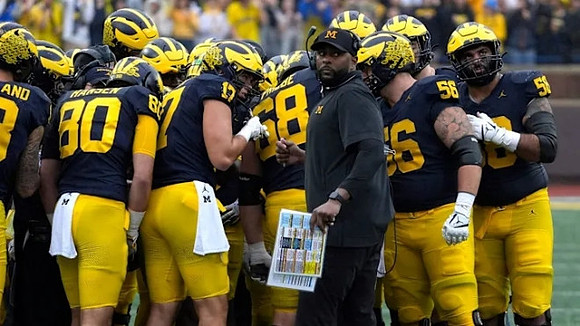 Sherrone Moore and Michigan Team