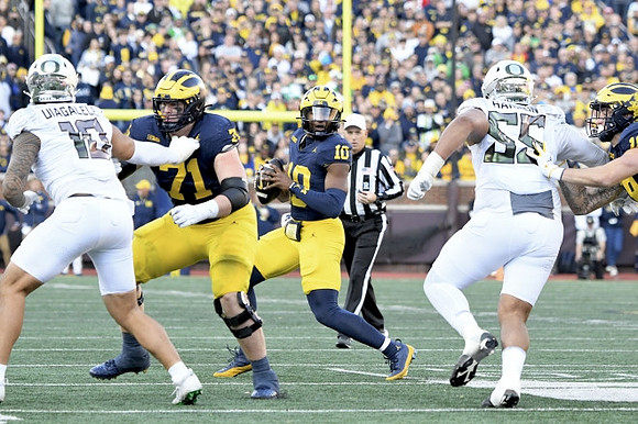 Evan Link (71) and Alex Orji (10)